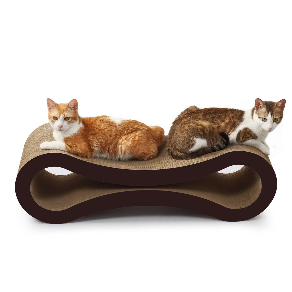 Two cats lounging on a modern cat scratcher with a white background